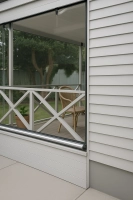 patio-with-pvc-blind-and-lattice-railing.jpeg