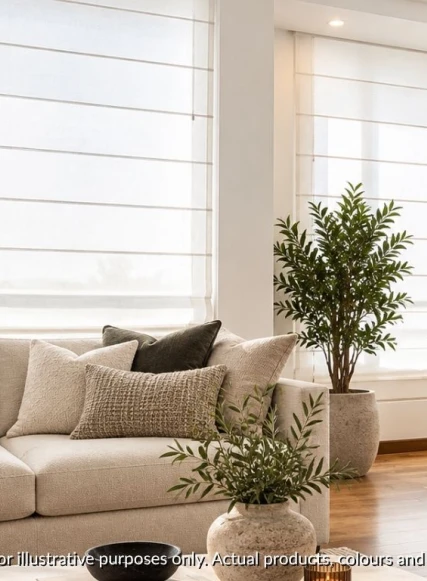 Open plan living area with light filtering romann blinds pulled down on two large windows